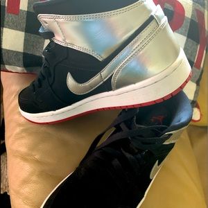 Jordan’s size 8, black,red, and silver.